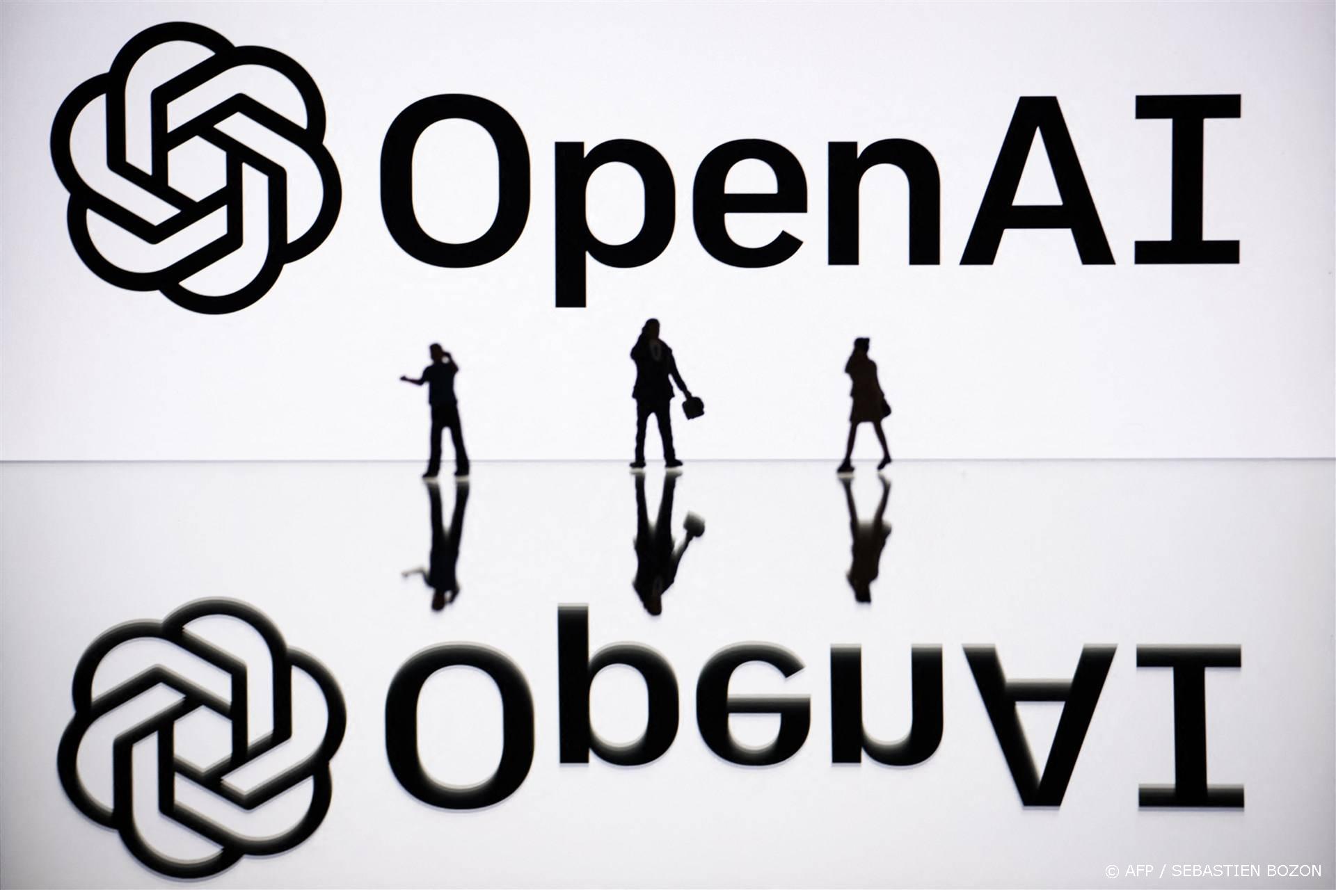 2023-10-30 09:31:26 This illustration photograph taken on October 30, 2023, in Mulhouse, eastern France, shows figurines next to a screen displaying a logo of OpenAI, a US artificial intelligence organisation. 
SEBASTIEN BOZON / AFP