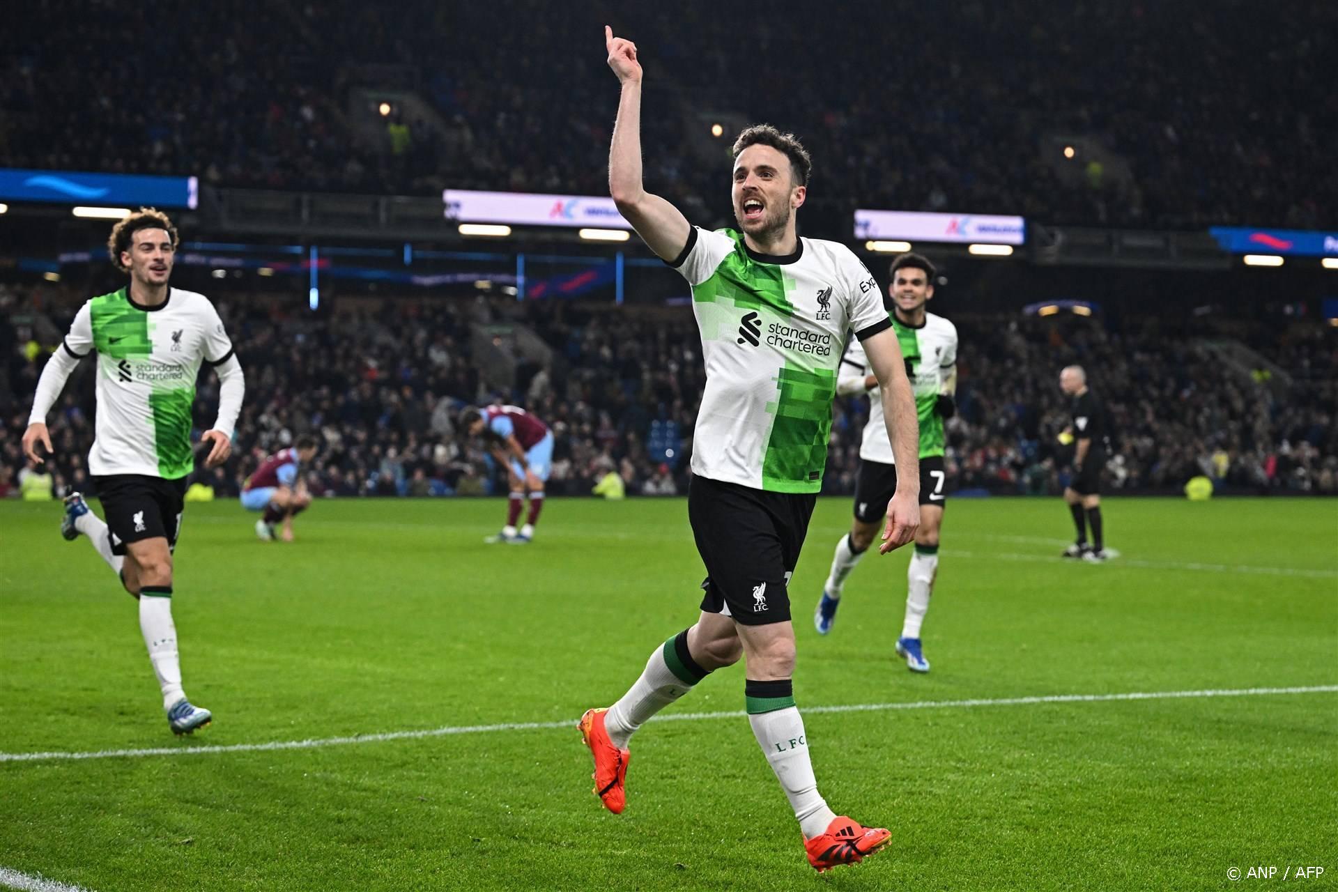 Liverpool's Portuguese striker #20 Diogo Jota celebrates after scoring their second goal during the English Premier League football match between Burnley and Liverpool at Turf Moor in Burnley, north-west England on December 26, 2023. 
Paul ELLIS / AFP