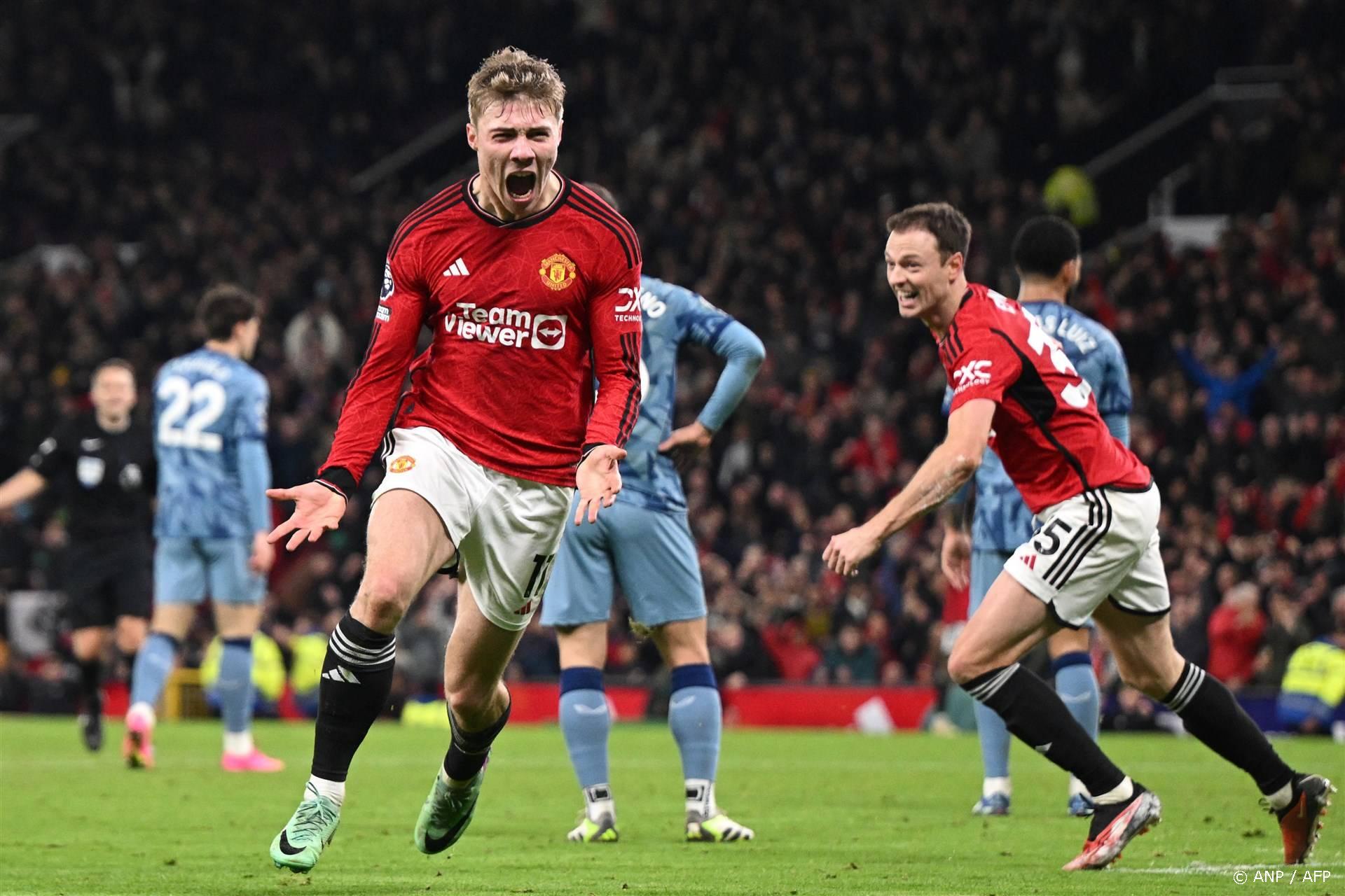 Manchester United's Danish striker #11 Rasmus Hojlund (C) celebrates after scoring their third goal during the English Premier League football match between Manchester United and Aston Villa at Old Trafford in Manchester, north west England, on December 26, 2023. 
Oli SCARFF / AFP
