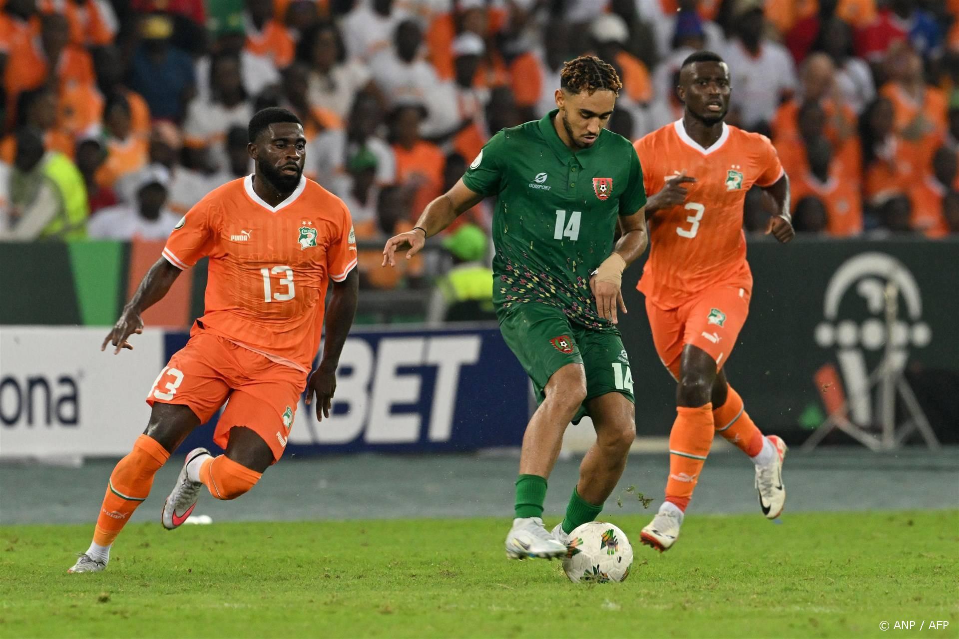 Guinea-Bissau's forward #14 Mauro Rodrigues controls the ball as he is marked by Ivory Coast's forward #13 Jeremie Boga during the Africa Cup of Nations (CAN) 2024 group A football match between Ivory Coast and Guinea-Bissau at the Alassane Ouattara Olympic Stadium in Ebimpe, Abidjan, on January 13, 2024. 
SIA KAMBOU / AFP