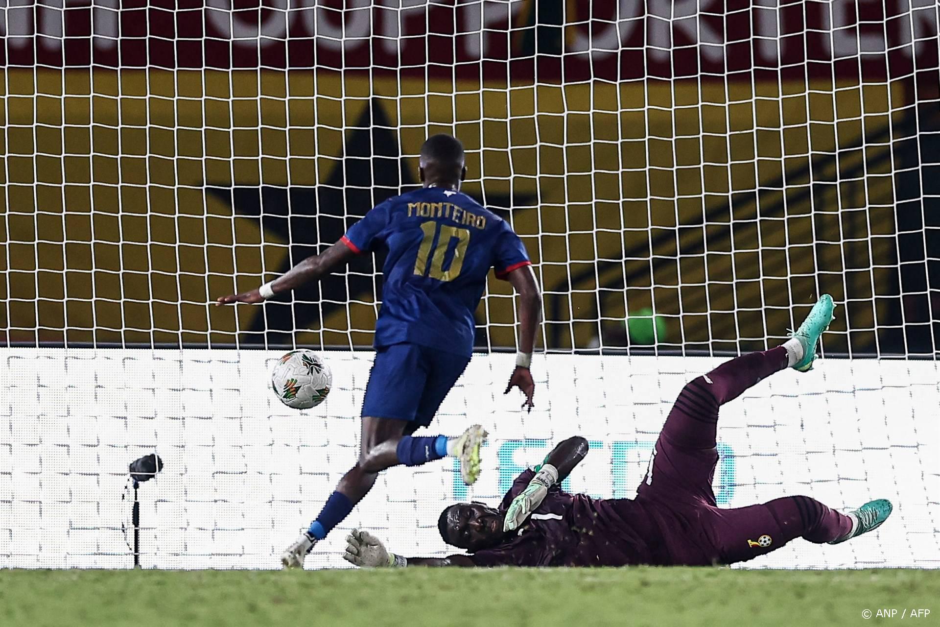 Cape Verde's midfielder #10 Jamiro Monteiro (L) kicks to score his team's first goal next to Ghana's goalkeeper #1 Richard Ofori (R) during the Africa Cup of Nations (CAN) 2024 group B football match between Ghana and Cape Verde at the Felix Houphouet-Boigny Stadium in Abidjan on January 14, 2024. 
FRANCK FIFE / AFP