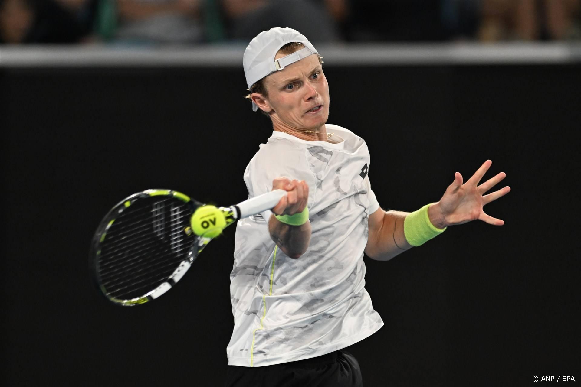 epa11083927 Jesper de Jong of Netherlands in action during his round 2 match against Jannik Sinner of Italy on Day 4 of the 2024 Australian Open at Melbourne Park in Melbourne, Australia, 17 January 2024.  EPA/LUKAS COCH AUSTRALIA AND NEW ZEALAND OUT