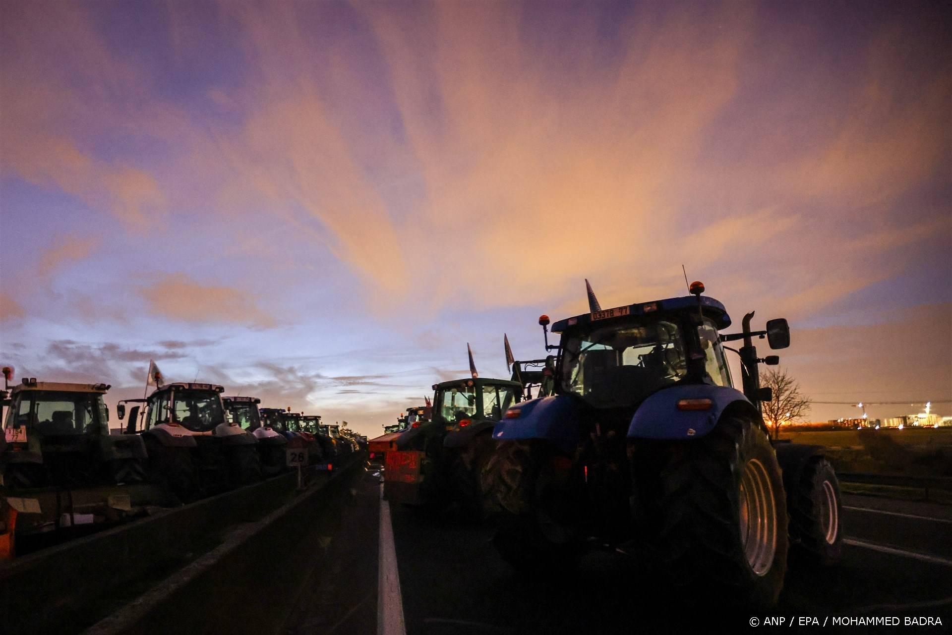epa11112966 Tractors park at blockade point on the A4 highway at Jossigny, near Paris, France, 29 January 2024. French farmers continue their protests with road blockades and demonstrations in front of state buildings awaiting a response from the government to their request for 'immediate' aid of several hundred million euros. On 23 January, the EU Agriculture and Fisheries Council highlighted the importance of providing the conditions necessary to enable EU farmers to ensure food security sustainably and profitably, as well as ensuring a fair income for farmers.  EPA/MOHAMMED BADRA