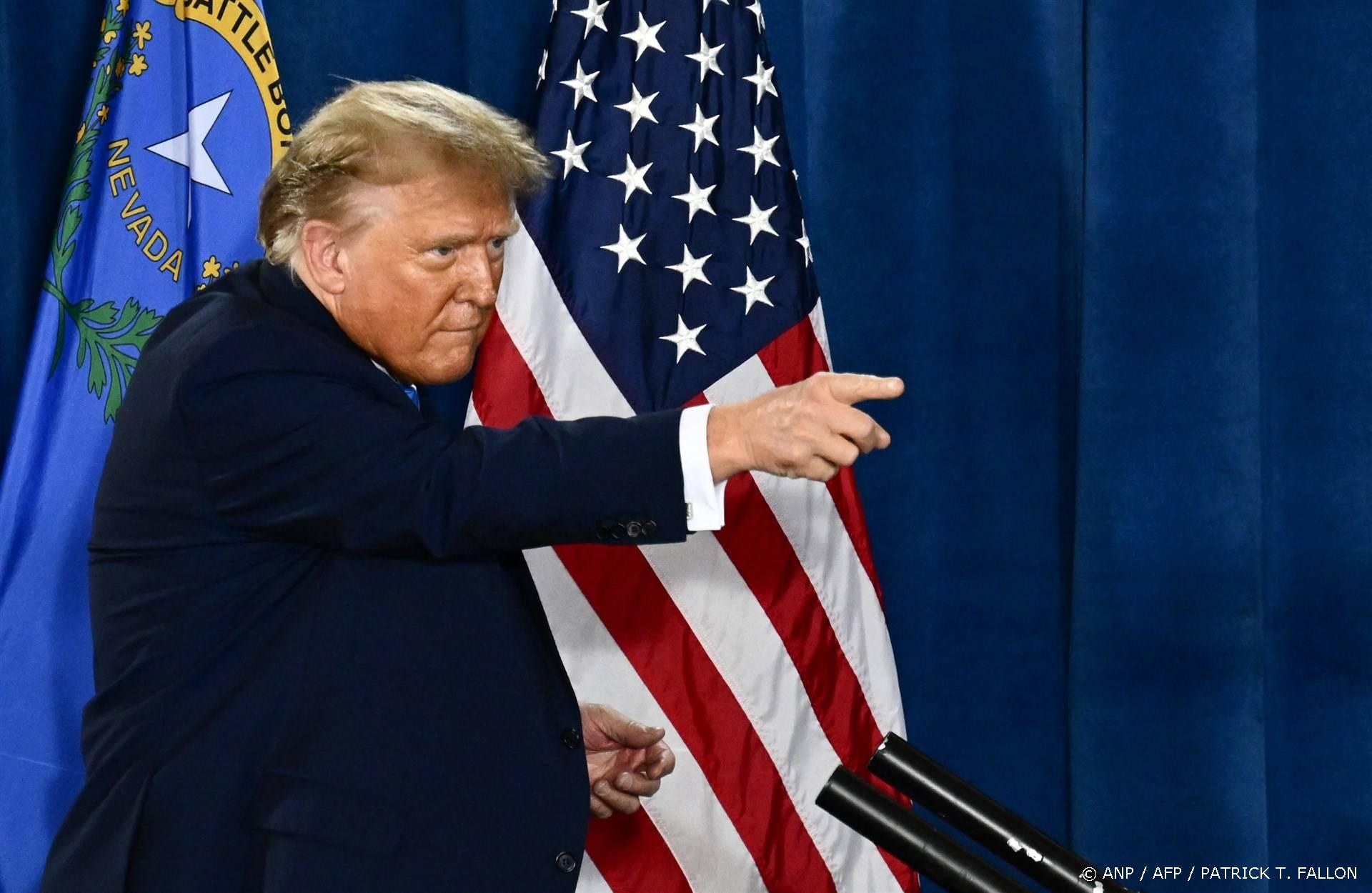 Former US President and 2024 presidential hopeful Donald Trump points after speaking at a Commit to Caucus Rally in Las Vegas, Nevada, on January 27, 2024.  
Patrick T. Fallon / AFP