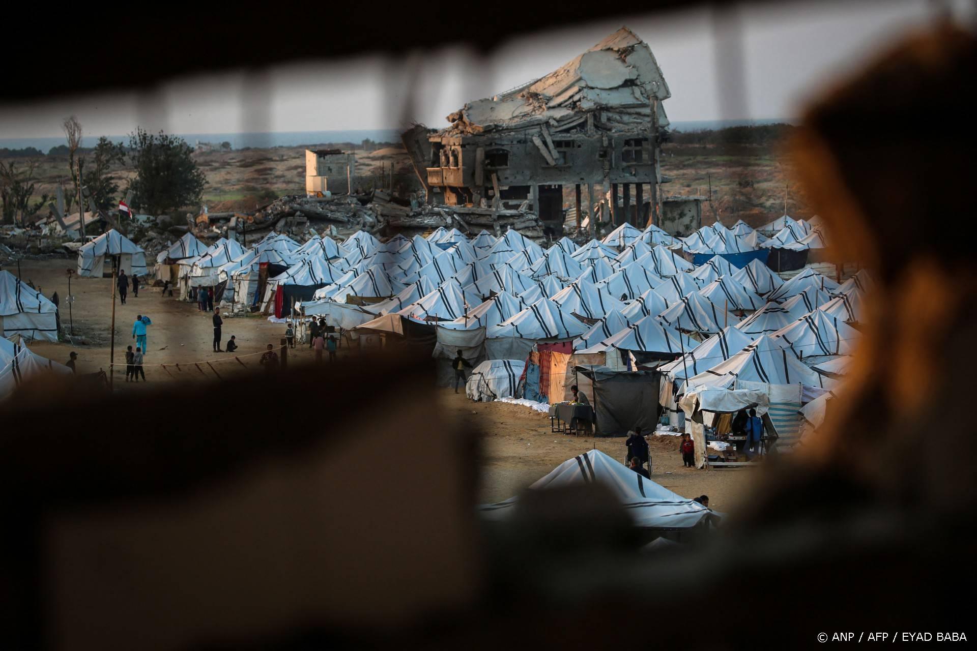 This picture shows shelters set up amid destroyed buildings at the Nuseirat camp for displaced Palestinians in the central Gaza Strip on December 4, 2025. The United States, alongside Qatar and Egypt, secured a truce in Gaza that came into effect on October 10 and has mostly halted two years of war between Israel and Palestinian militant group Hamas.
Eyad Baba / AFP