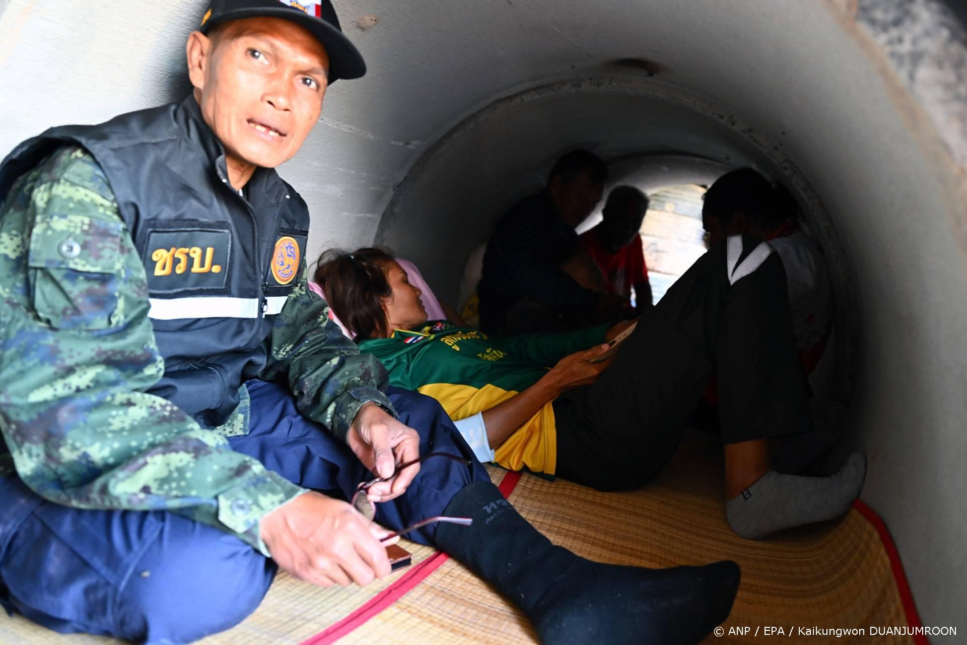 epa12577977 Thai villagers take shelter under a concrete bunker following clashes between Thai and Cambodian troops in Phanom Dong Rak district, Surin province, Thailand, 08 December 2025. The Royal Thai Army has reported a Thai soldier was killed and other eight wounded in the multiple border area clashes between Thai and Cambodian troops after Cambodian troops attacked in the Phu Pha Lek hill of Phlan Hin Paet Kon area in Kantharalak district, Si Sa Ket province that prompted the evacuation of residents in four northeastern provinces bordering Cambodia, according to Thai Army spokesman Major General Winthai Suvaree. EPA/KAIKUNGWON DUANJUMROON