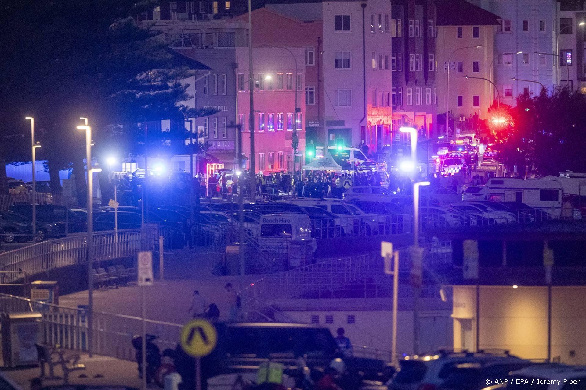 epa12591103 Police and emergency services work at the scene following a shooting incident at Bondi Beach, in Sydney, New South Wales (NSW), Australia, 14 December 2025. NSW Police confirmed at least ten deaths, including one alleged shooter, following the incident at Bondi Beach. Eleven others were injured, including two police officers. Authorities said the second alleged shooter remains in critical condition and is in custody. EPA/JEREMY PIPER AUSTRALIA AND NEW ZEALAND OUT