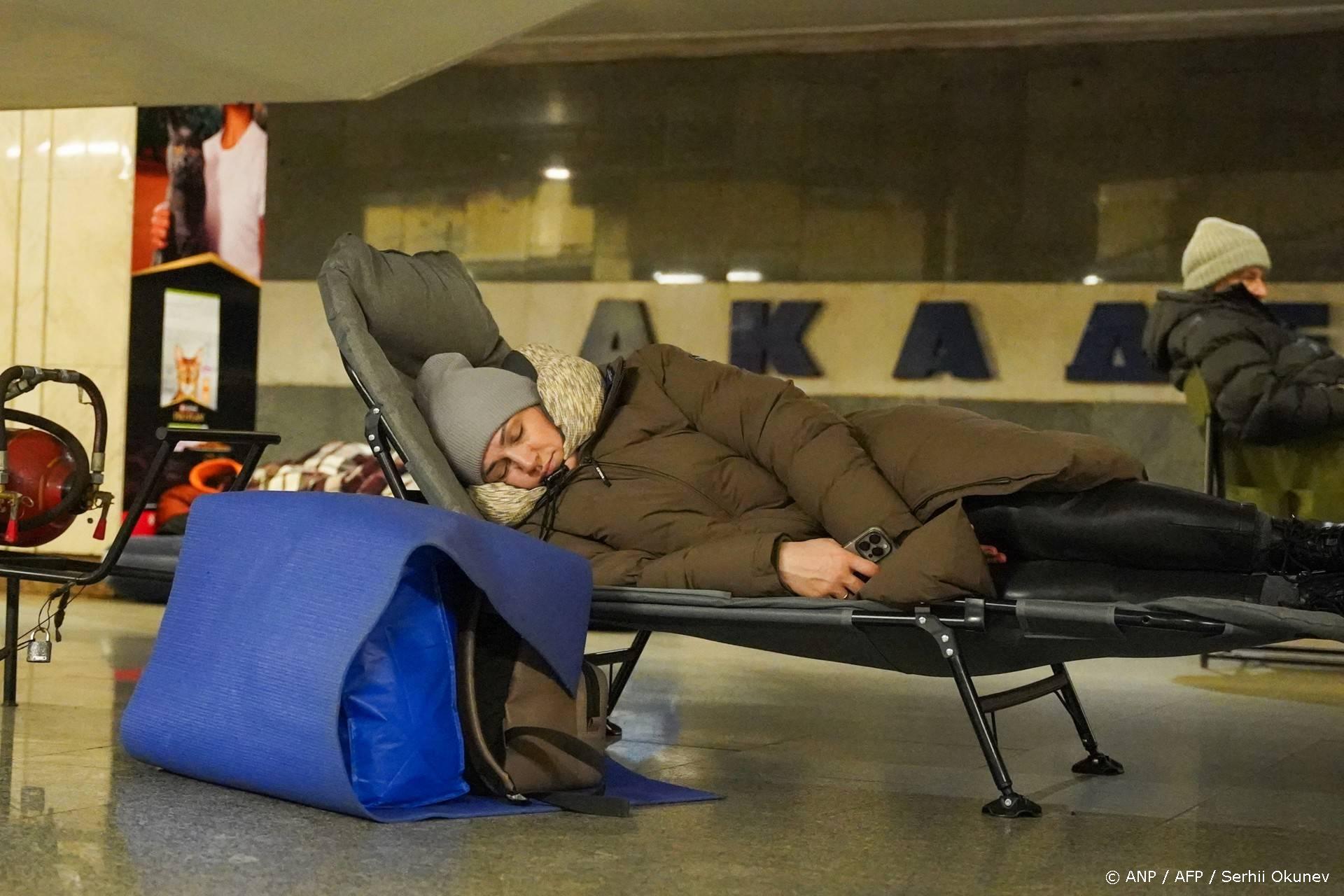 People take shelter at a metro station during Russian air attacks in Kyiv on December 27, 2025, amid the Russian invasion of Ukraine. Several powerful explosions rocked Kyiv on Saturday as authorities warned that the Ukrainian capital was under threat of missile attack.
